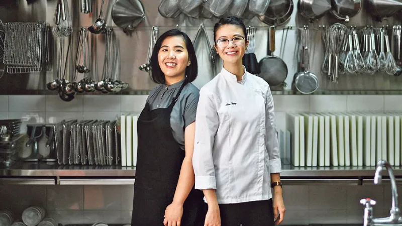 students in a restaurant kitchen